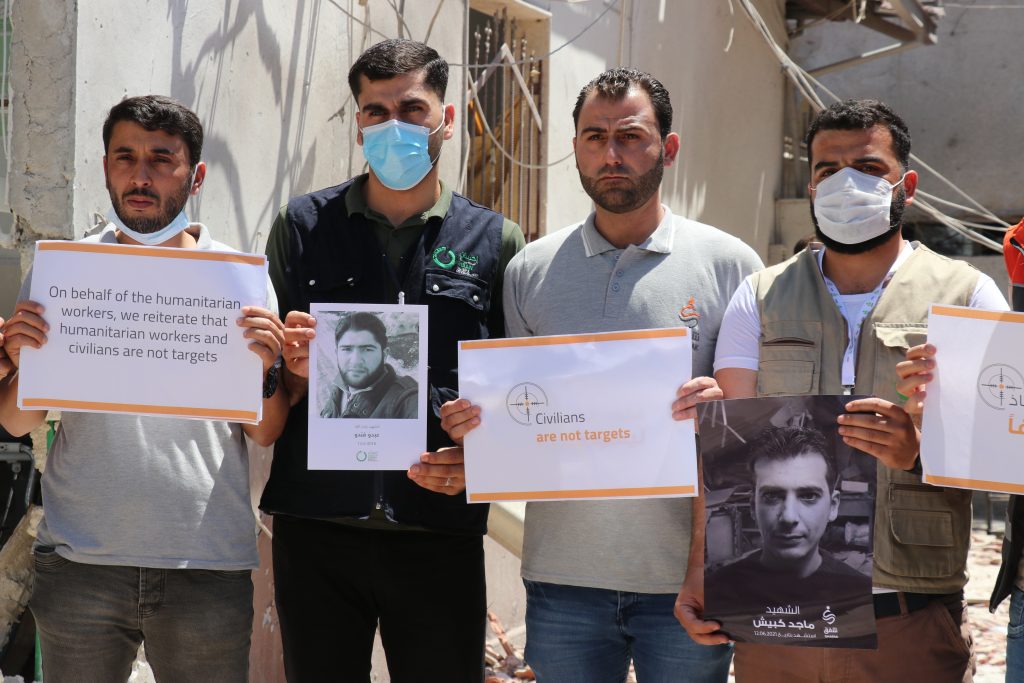 وقفة احتجاجية لعدد من المنظمات أمام مشفى الشفاء في عفرين- 16 من يونيو/ حزيران 2021 (السورية نت)